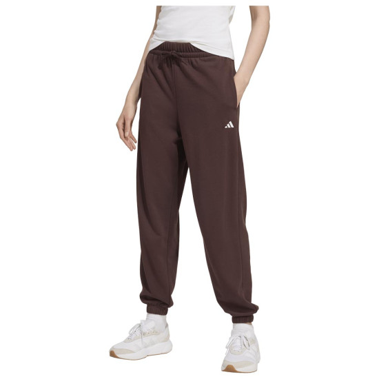 Adidas Γυναικείο παντελόνι φόρμας Essentials Small Logo French Terry Cuffed Pants Adidas Γυναικείο παντελόνι φόρμας Essentials Small Logo French Terry Cuffed Pants